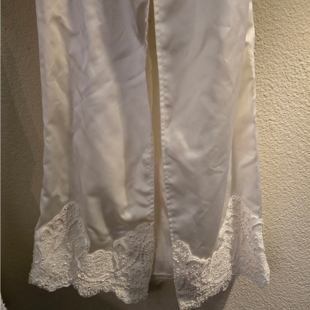 Ivory Lace Appliqué Satin Wedding Gown - Picture 16 of 16